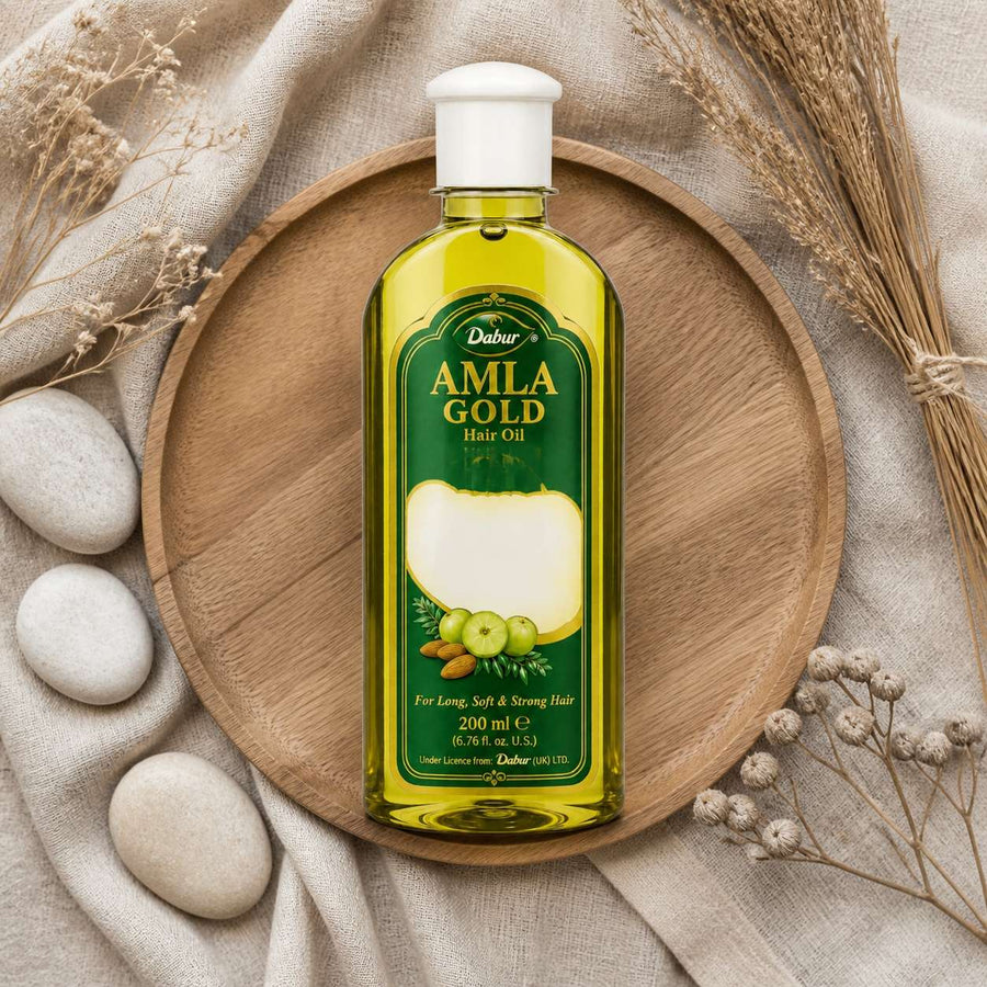 Huile Amla Gold Dabur 200 ml - Huile Capillaire – composition flat lay avec éléments naturels, vue du dessus