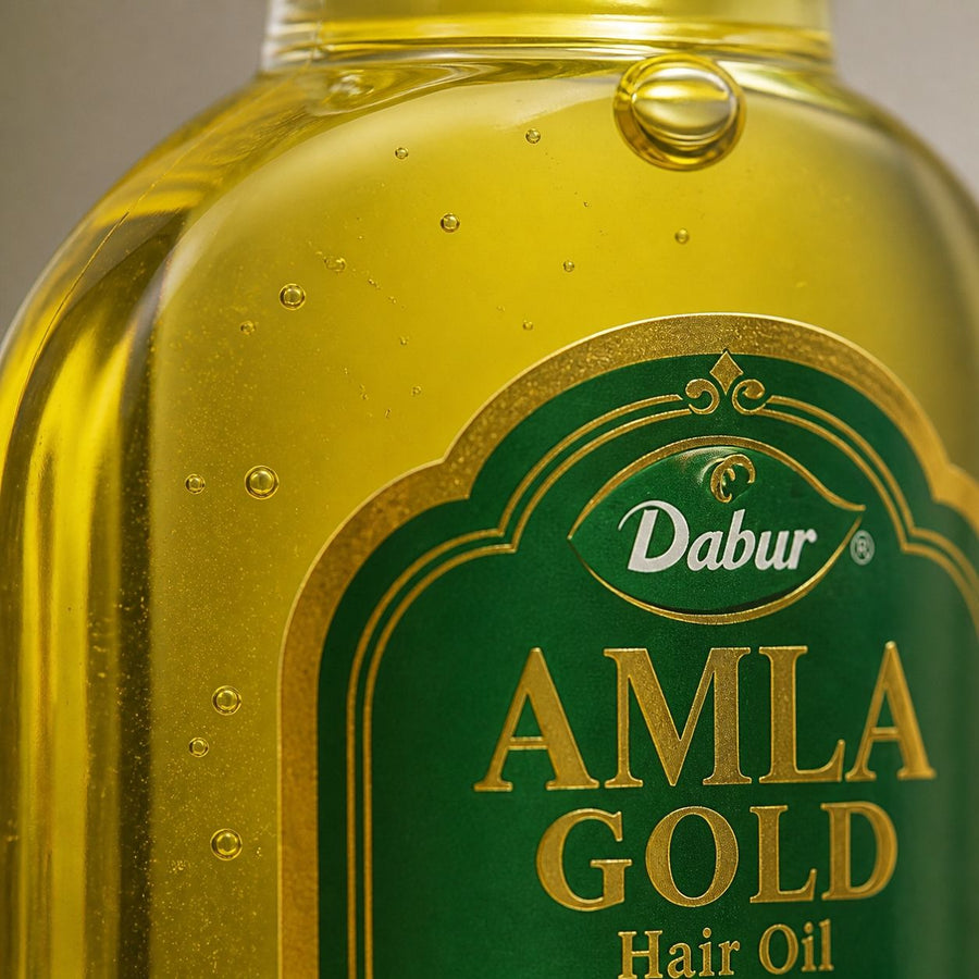 Huile Amla Gold Dabur 200 ml - Huile Capillaire – gros plan sur la texture et la matière