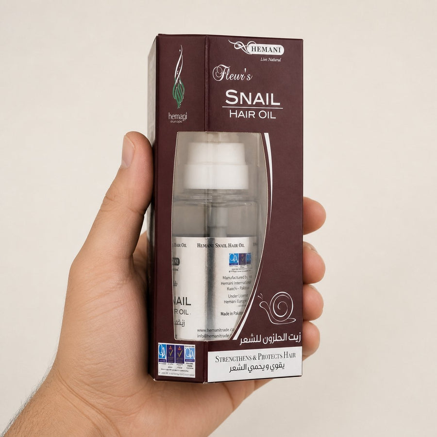 Pack 1 Crème à la bave d'escargot + 1 Huile d'escargot HEMANI 60ml – taille et contenance réelles du produit en main