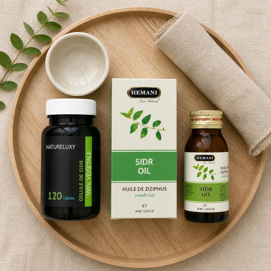 Pack 120 gélules de Sidr + Huile de Sidr 30mL Hemani – rituel d'utilisation vu du dessus, ambiance naturelle zen