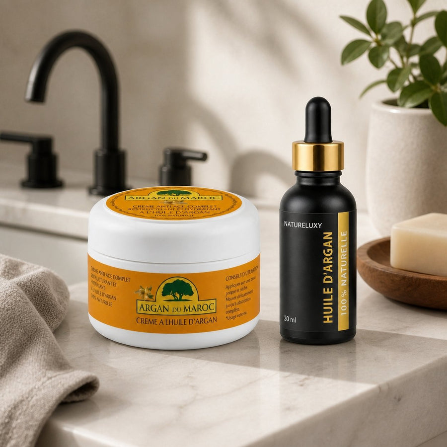 Pack Huile d'Argan 30mL Pipette + Crème à l'Huile d'Argan – présentation du produit dans une salle de bain lumineuse et naturelle