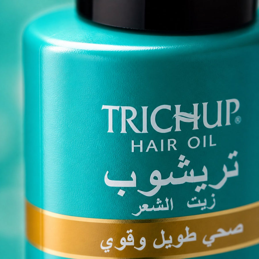 Pack Huile pour la Pousse des Cheveux 200mL + Huile Anti-chute 100mL Trichup – gros plan sur la texture et la matière