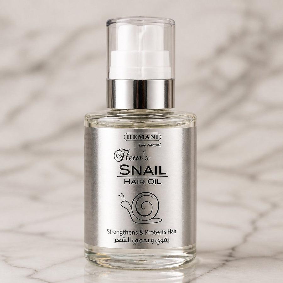 Huile capillaire à la bave d'escargot - Hemani 60mL – gros plan sur les détails et la finition du packaging