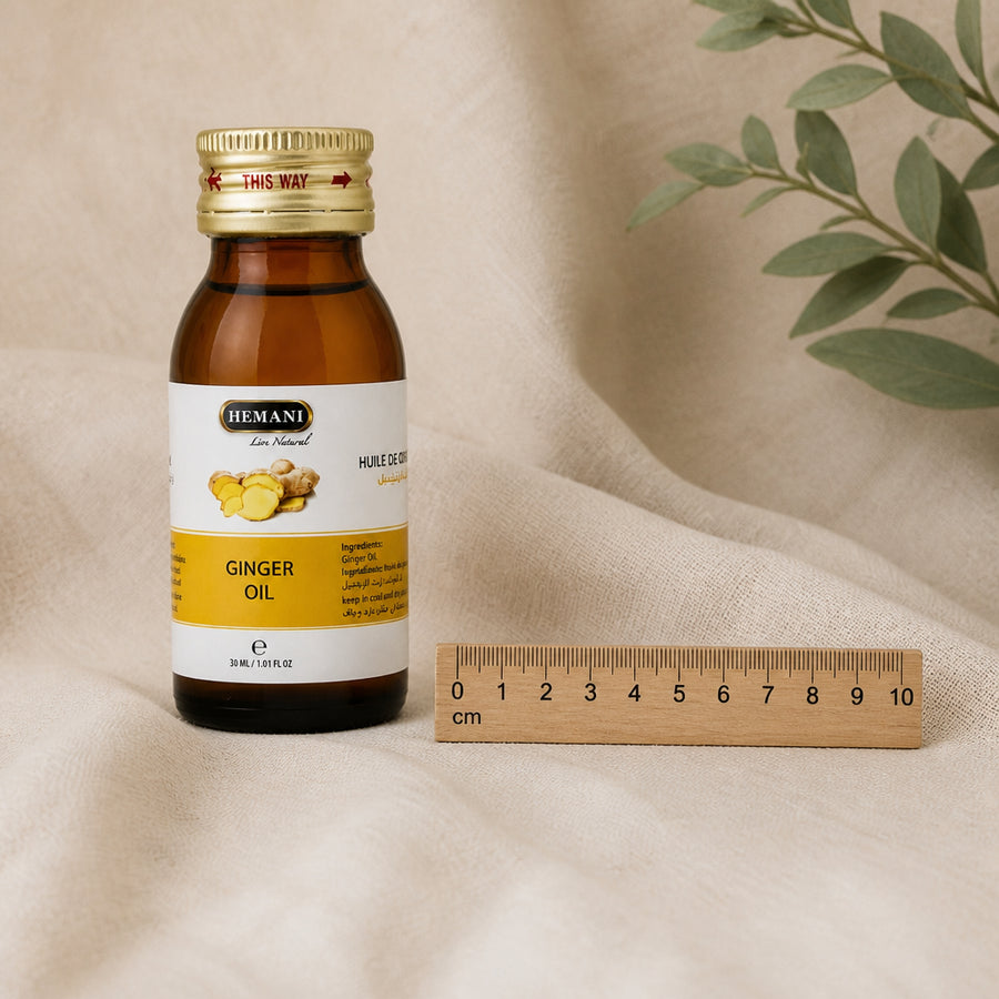 Huile de Gingembre 30mL 100% Naturelle Hemani - référence échelle 10 cm avec règle en bois, packaging d'origine préservé